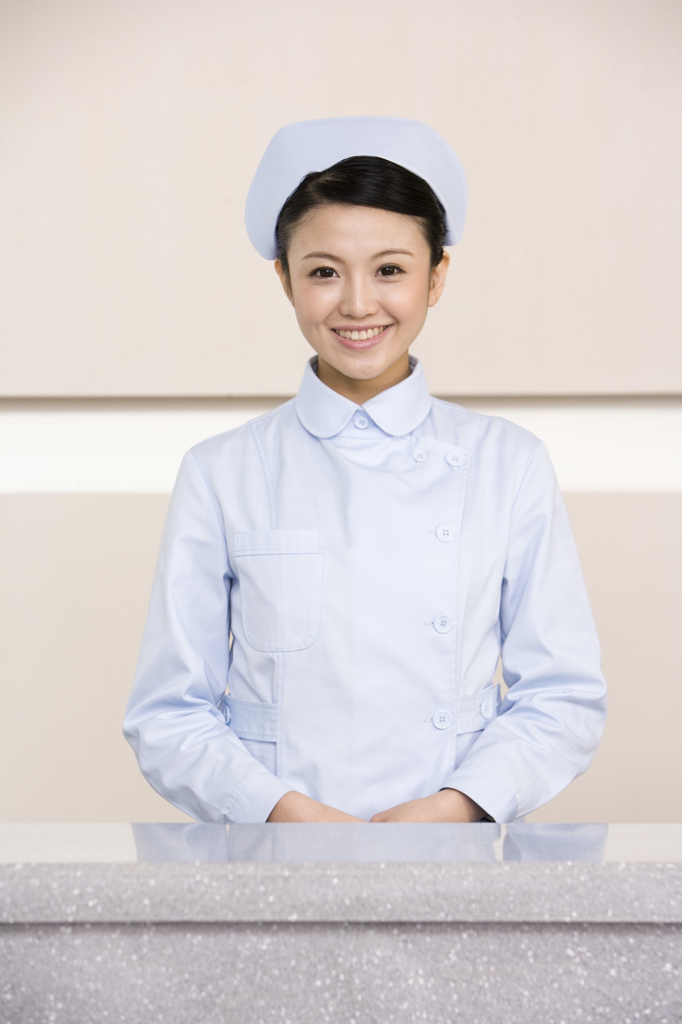 young-nurse-poised-at-nurses-station.jpg